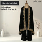 Black velvet kaftan and sharara set with embroidery on a mannequin against a neutral background, featuring the brand 'pehnara'.
