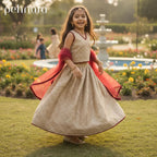 Young girl in a traditional outfit standing in a garden with 'pehnara' branding.