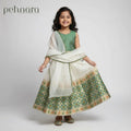 Young girl wearing a green and white traditional outfit with 'pehnara' branding.